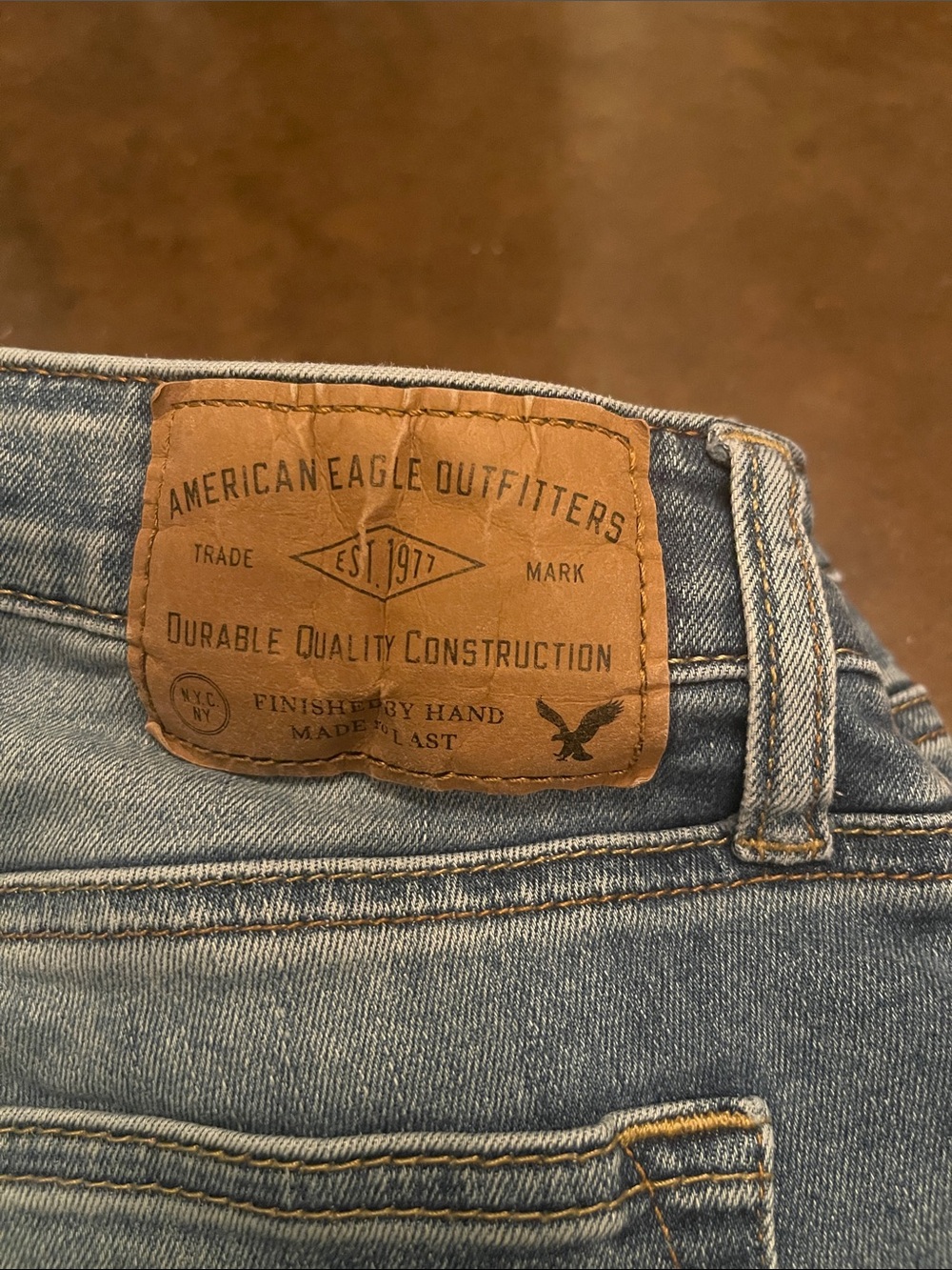 American Eagle Outfitters Light Blue Denim Jeans with Leather Logo Patch